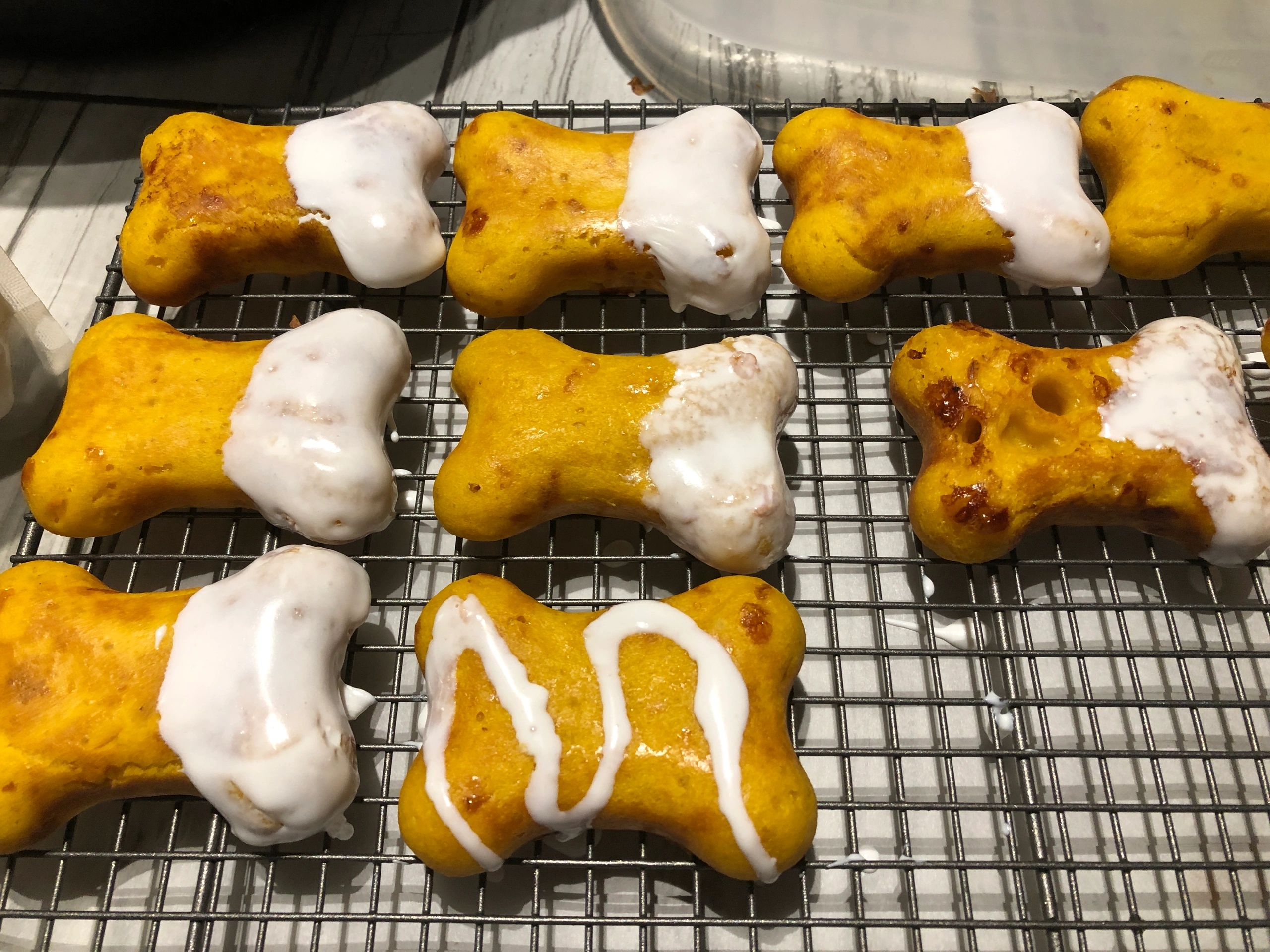 Dog bone-shaped treats with icing